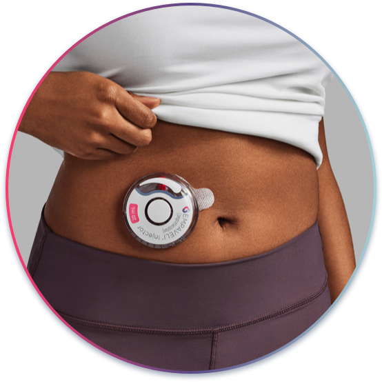 Photo of patient wearing EMPAVELI Injector on the abdomen
